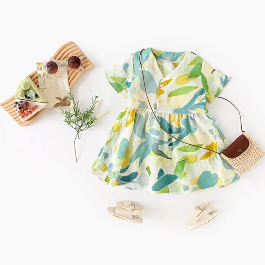 Children's dress with leaf pattern on a white background