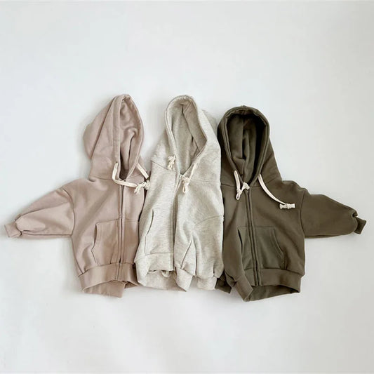 Three hoodies in beige, gray, and green on a white background